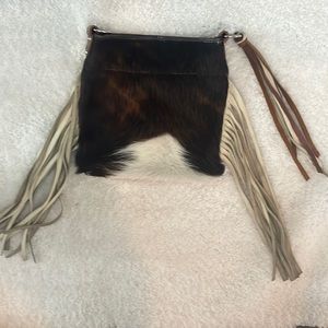 Super cute leather and fur with tassels crossbow bag